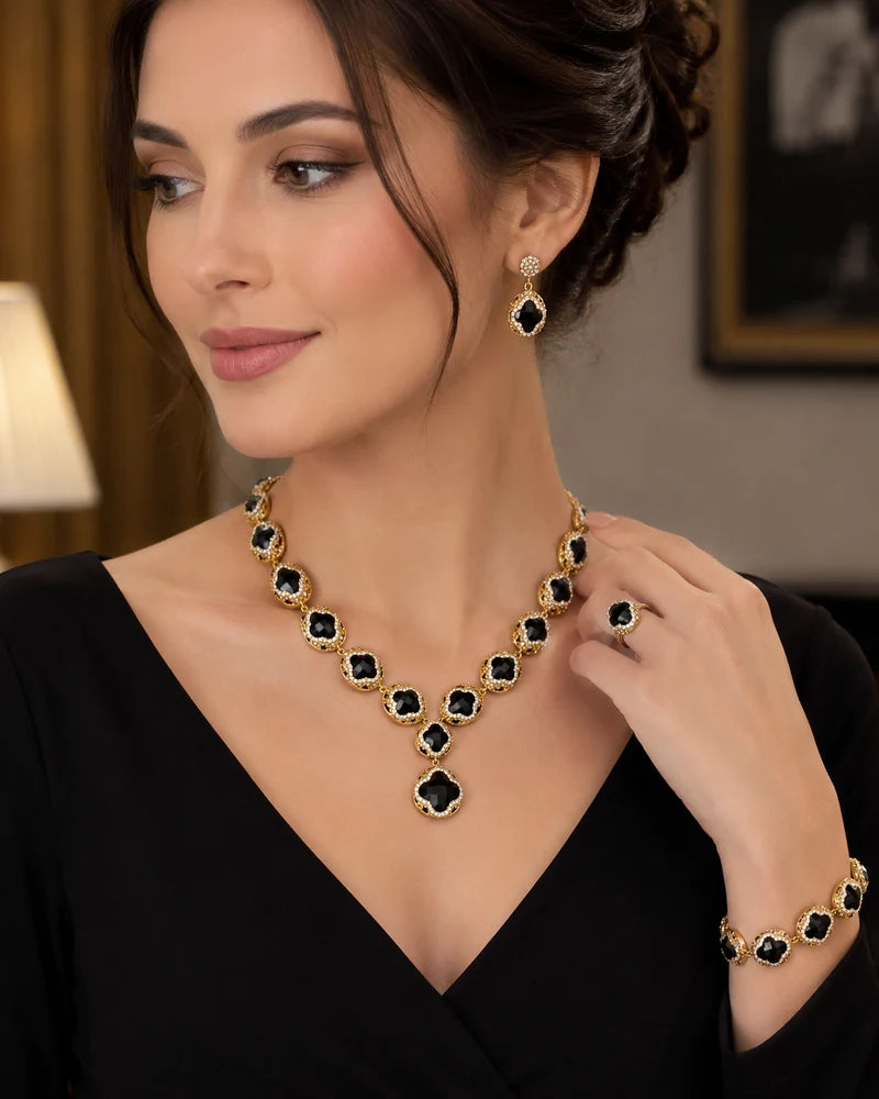 Luxury Vintage Jewelry Set | 4-Piece Gold-Toned Black Quatrefoil Necklace Earrings Ring Bracelet - طقم مجوهرات عتيق فاخر | قلادة وأقراط وخاتم وسوار بتصميم براند منقوش بأحجار سوداء
