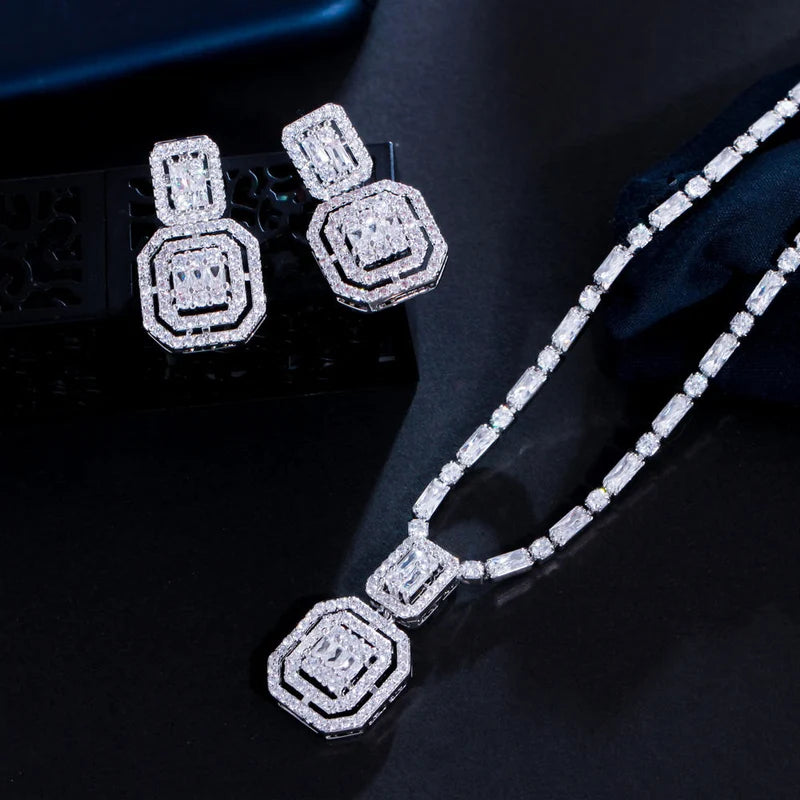 Luxury Bridal Jewelry Set | 4-Piece Silver-Toned Rectangular Diamond-Style Cluster Ensemble - طقم مجوهرات زفاف فاخر | قلادة وأقراط وخاتم وسوار بتصميم ألماس مستطيل